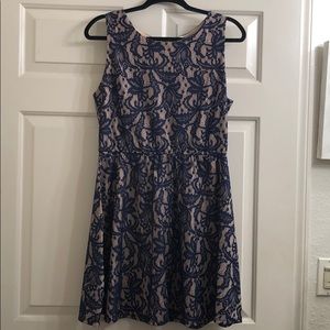 Navy blue skater dress with nude underlay